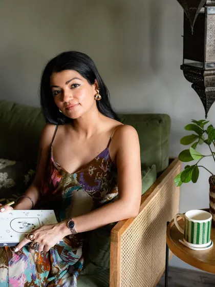 A portrait of a woman in her cozy living room. These at-home sessions are my favorite, as they allow for a natural and relaxed atmosphere.