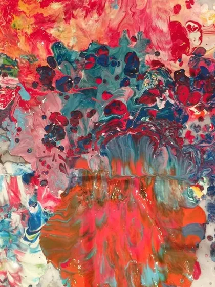 A beautifully chaotic and colorful canvas created during a group art activity. This piece shows the result of layering multiple colors and techniques.