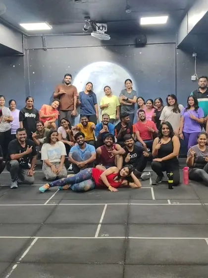 The heart and soul of my classes. Each photo captures a unique moment with my incredible community after a sweaty, joyful session. This is our shared victory lap.