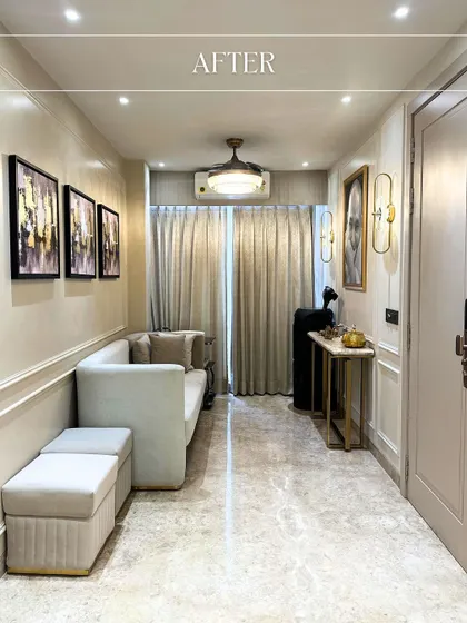 A transformed hallway featuring a comfortable daybed, elegant wall sconces, and curated artwork, creating a functional and beautiful transition space.
