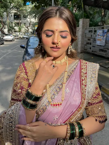 A close-up on the plum eyeshadow, a modern twist on a traditional look.