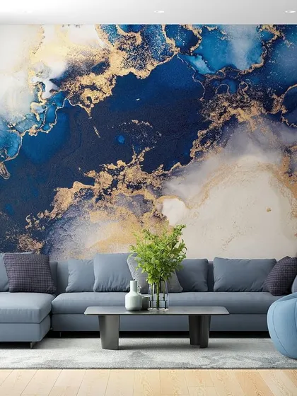 Another look at the stunning blue and gold liquid art wallpaper, showcasing its vibrant colors and luxurious feel in a modern living room.