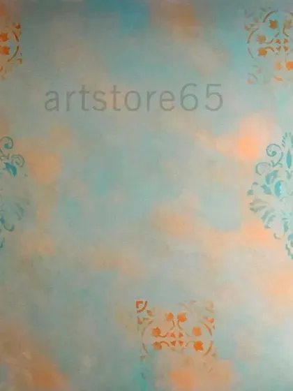 A close-up of the stenciled motifs on the restaurant wall. The patterns are placed sparsely to complement the colorful, cloudy background without making it look too busy.