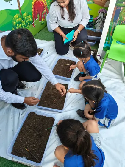 Our instructors guide a group of young paleontologists as they carefully dig for dinosaur fossils. This sensory activity is great for developing fine motor skills and sparking curiosity.