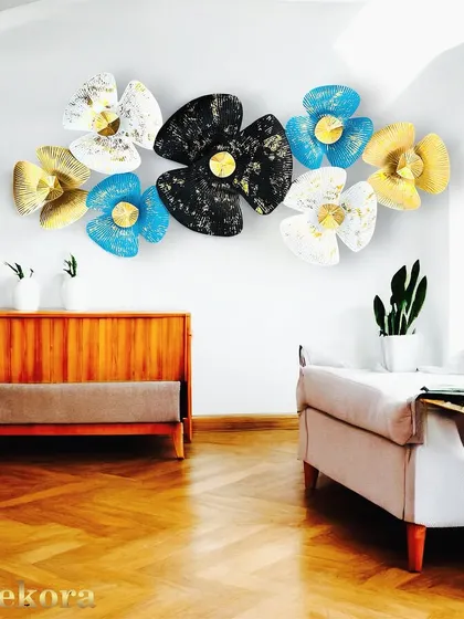 This latest design in wall decor art shows how different colors and shapes can come together to form a cohesive and beautiful sculpture.
