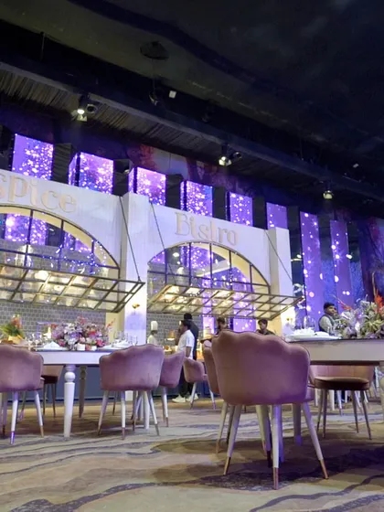 A custom-designed "Spice Bistro" food station, complete with elegant seating. We create bespoke restaurant concepts within your event, offering guests a unique and immersive dining experience.