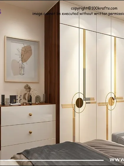 A bedroom from the 'Traditional Contemporary' Pune project, featuring a stunning wardrobe with intricate gold detailing and a matching chest of drawers.