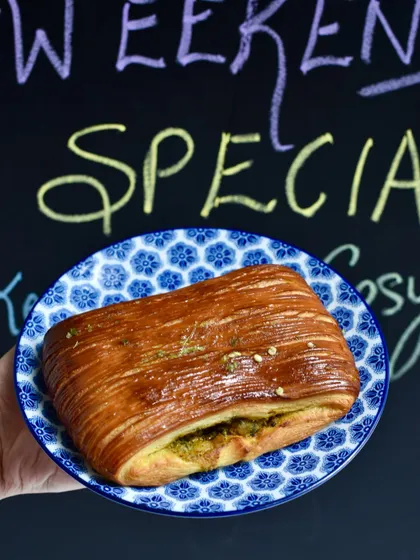 Our Kasundi Chicken Pain Suisse, a weekend special inspired by Bengali flavours. The sharp, tangy kasundi mustard gives this savoury pastry a wonderful kick.