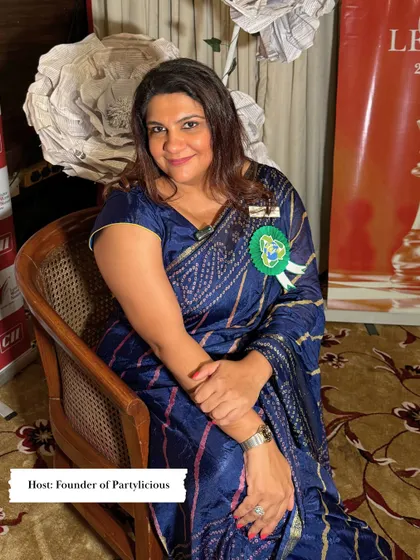 Here I am at a sustainability event I helped organize and decorate. This photo captures me in my element, combining my passion for beautiful decor with my mission to promote eco-friendly practices.