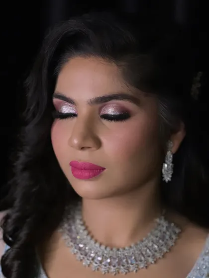 A close up of this stunning engagement bride's makeup. The shimmery eyes and pink lips are a perfect combination.