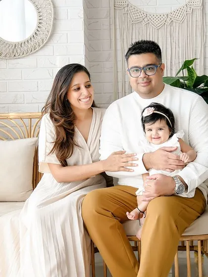 A stylish family portrait in my boho-chic studio. The natural textures and light colors create a relaxed and modern feel.