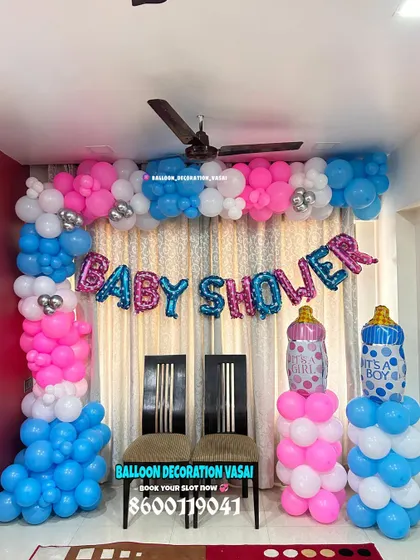 This setup is another great example of a compact home decoration. By adding balloon pillars shaped like baby bottles, I can enhance the theme and create a fuller look.