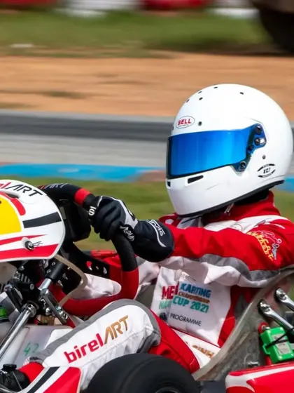 A close-up action shot of our driver in the BirelART kart, showcasing the focus required to compete at the front of the pack in events like the Meco Karting Cup.