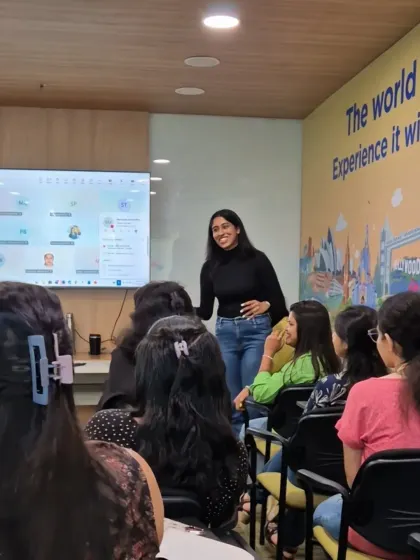 A candid moment from a team-building session I hosted. A smile and positive energy are key to making a corporate audience feel comfortable and ready to participate.