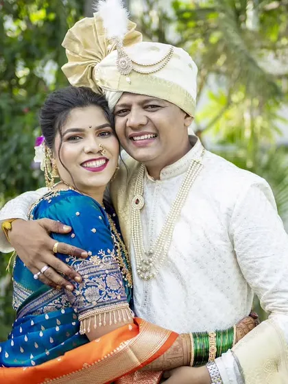A joyful, hugging portrait that perfectly captures the happiness of the wedding day.