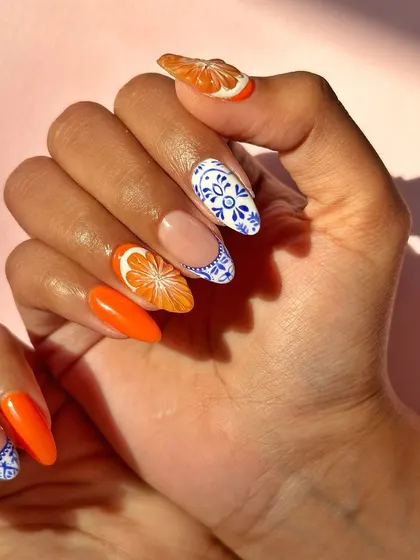 Bring me your inspiration and I'll make it happen. This set was inspired by Mediterranean tile art, featuring hand-painted blue and white patterns paired with juicy, 3D sculpted orange slices for a perfect summer vibe.