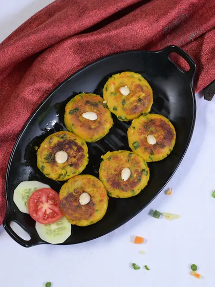 Veggies take center stage in this delicious Badami Tikki. Packed with nutritious vegetables and topped with crunchy almonds, it's a delectable mix of flavours.