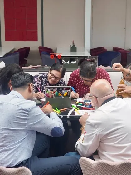 A table of creativity at our art fundraiser. We love seeing our community come together, share a fun experience, and support our mission all at once.