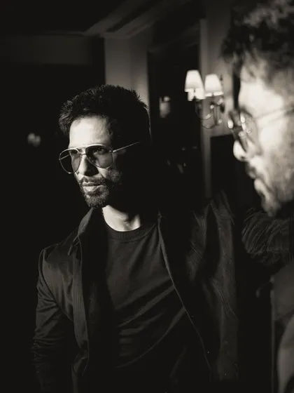 A moody black and white version of this reflective shot, which enhances the cinematic and mysterious vibe.