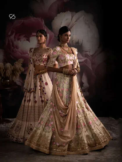 This image captures the allure of true beauty in my exquisite bridal lehengas. These masterpieces are crafted to enhance your radiance on your special day, with every detail considered.