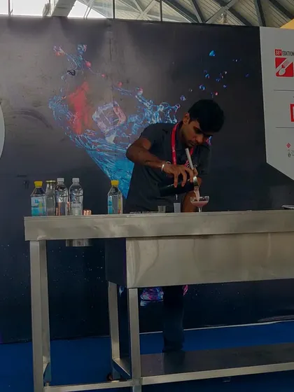 Another shot of a bartender competing at the mixology championship. The level of skill on display is always inspiring.