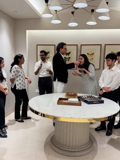Sharing a piece of birthday cake with Riya. Small gestures of appreciation are important for morale and team spirit.