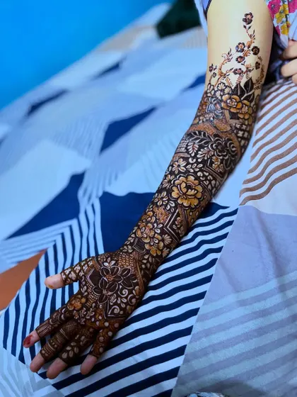 A full arm view of a floral design with a khafeef (light/delicate) touch, perfect for a Nikah bride.
