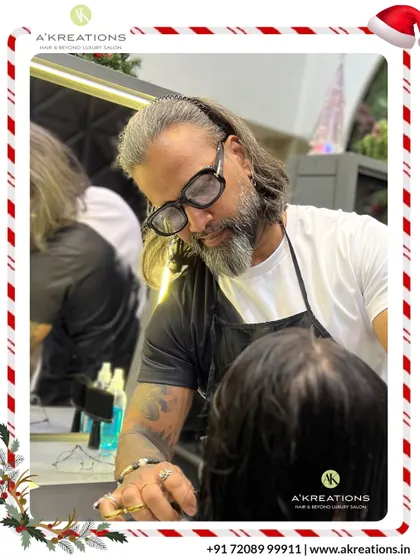 Style Director Derick Francis consults with a client, ensuring every detail is perfect. This personalized attention is a hallmark of our service.
