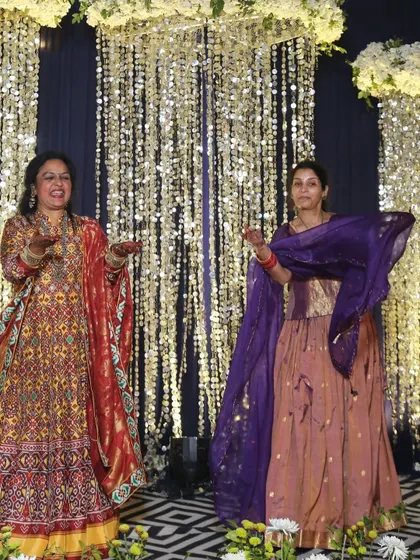 Two lovely ladies from the family enjoying their performance at the mehendi. Their colorful outfits looked amazing.