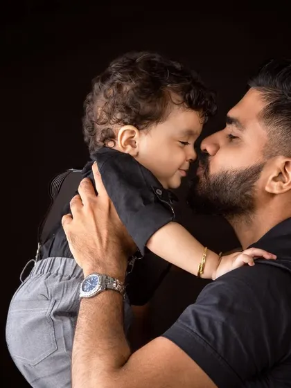 A tender moment between a father and his son. These close-up, emotional shots are a beautiful addition to any birthday or family session.