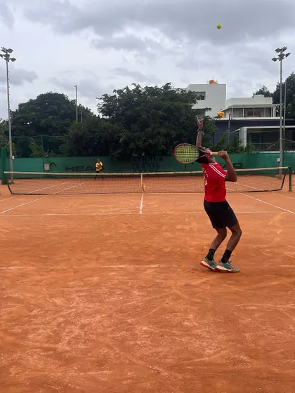 A powerful serve from one of our pro players, Adil Kalyanpur, during a training block before an ITF Futures tournament. We prepare our athletes for the demands of the international circuit.
