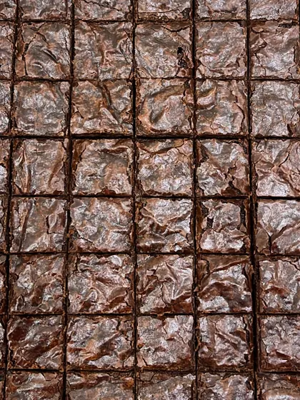 Look at that crinkle top. Our most-loved brownies are incredibly gooey and chocolatey, and you'd never guess they are completely eggless and made without any refined sugar.