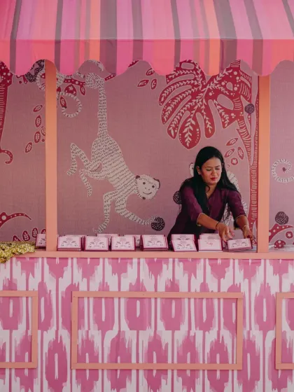A whimsical "Saturday Market" themed event in Udaipur, with custom-designed stalls for a Chai House, Frozen Yoghurt, and Ice Gola, complete with unique branding and playful decor.