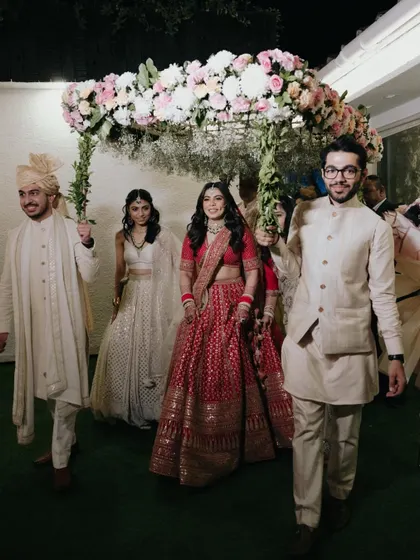 The bride's entrance with her family, a classic wedding moment filled with emotion and anticipation.