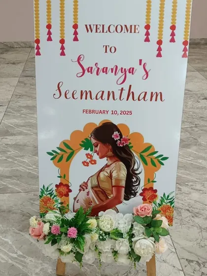 A personalized welcome sign for a traditional South Indian baby shower, known as Seemantham.