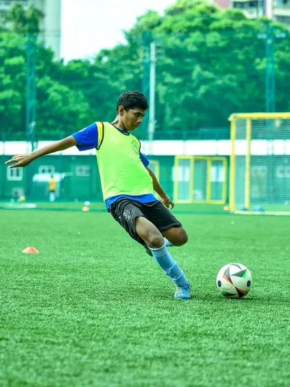 A U15 player practices his shooting technique, striking the ball with perfect form. This is a glimpse of the hard work our players put in to prepare for the upcoming season.