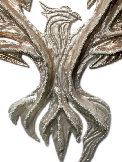 A close-up of the body of "The Eternal Flight," showing the texture and shimmer of the rough diamonds embedded in the upcycled paper.