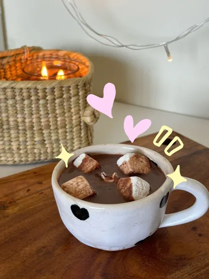 Bringing in the fall vibes with a cozy cup of hot chocolate, complete with marshmallow doodles and sparkles.