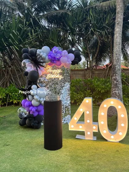 Celebrating 40 is a big deal. My designs for this milestone often include glamorous elements like sequin walls and neon signs, with customizable color palettes to suit any taste.