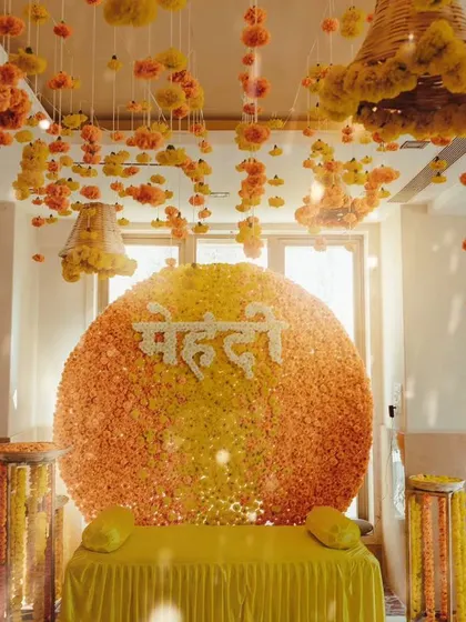 You can never go wrong with a classic. This vibrant mehendi backdrop is made entirely of fresh genda phool (marigolds), creating a sun-kissed, traditional setting that is both timeless and joyful.