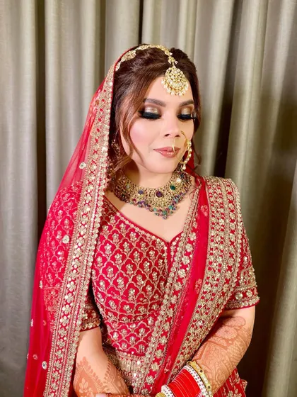 A close-up showing the soft, shimmery eye makeup and flawless base that looks beautiful with her eyes closed.