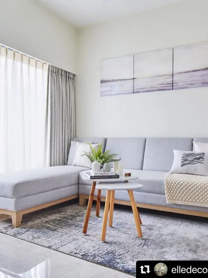 The living room as featured in Elle Decor India. The open layout meets plenty of daylight, while the elegant interiors create a comfortable sense of luxury.