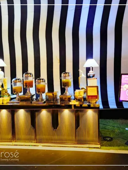 Our chaat station is elegantly designed with a black-and-white striped backdrop and modern lighting. We believe the presentation of our live counters should match the luxury of the food we serve.