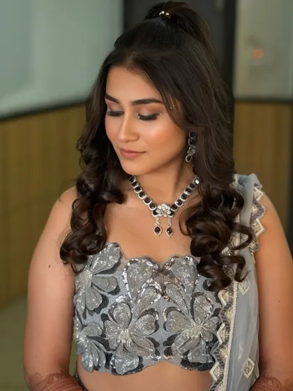 A close-up of the sangeet glam, with eyes closed to show the beautiful blending of the eyeshadow. The look is soft, shimmery, and perfect for an evening event.