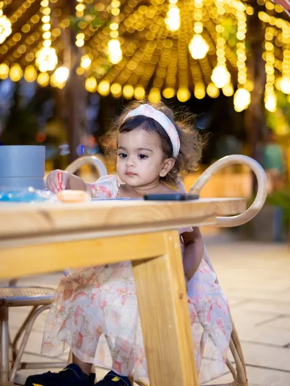 A candid shot of the birthday girl at her activity table, completely absorbed in her creative project. These are the quiet, happy moments we love to facilitate.