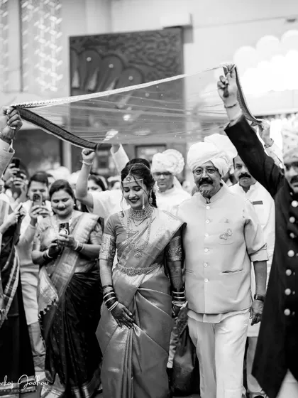 A timeless black and white shot of the bride's processional.