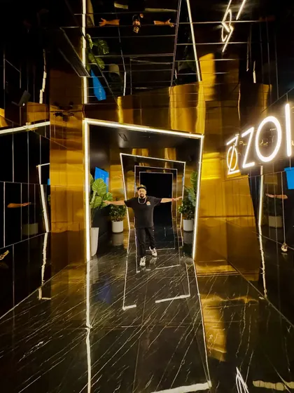 A wider shot of the reflective hallway, capturing the full effect of the cool design.