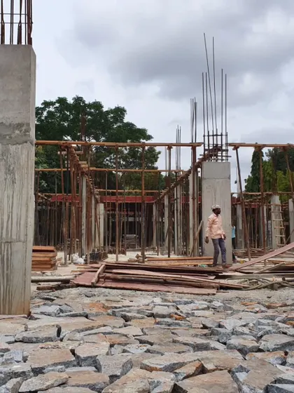 The ground floor structure begins to take shape at the Campus Biovet project. The random rubble foundation work is visible, showcasing the early stages of construction before the columns rise.