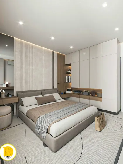 Another view of the same bedroom, showing the full-wall wardrobe with integrated open shelving.