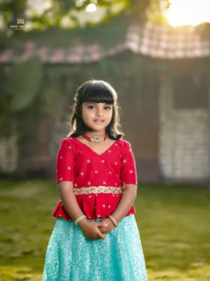 A beautiful portrait of a young girl in our garden. The soft evening light and her sweet expression make this a truly lovely and timeless kid's portrait.